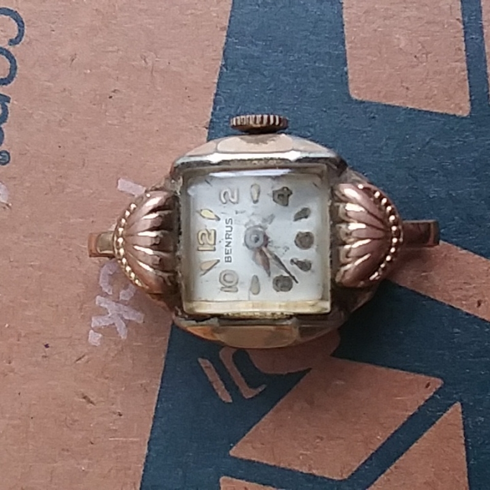 A vintage  benrus 10k r.g.p. bezel watch face no band